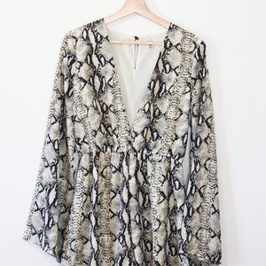 Tobi | Snakeskin Bell Sleeve Deep V Romper